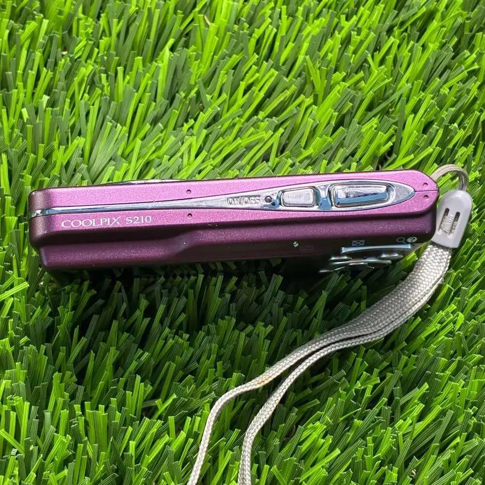Nikon Coolpix S210 Digital Camera Purple Bundle with Charger and Memory Card